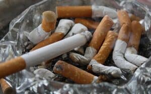 Cigarettes contribute to pollutants that cause red eyes